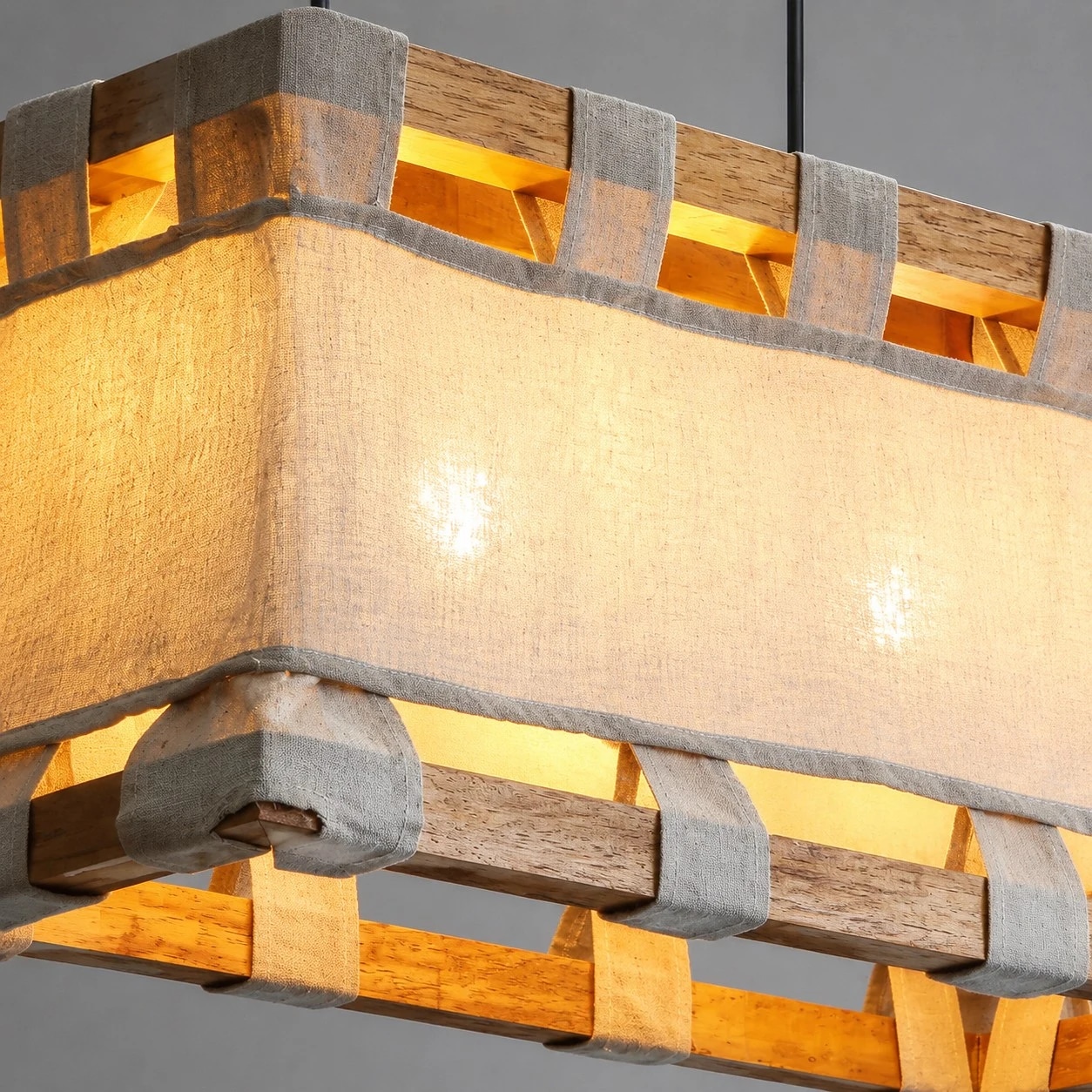 Wood frame close-up on warm fabric pendant lamp
