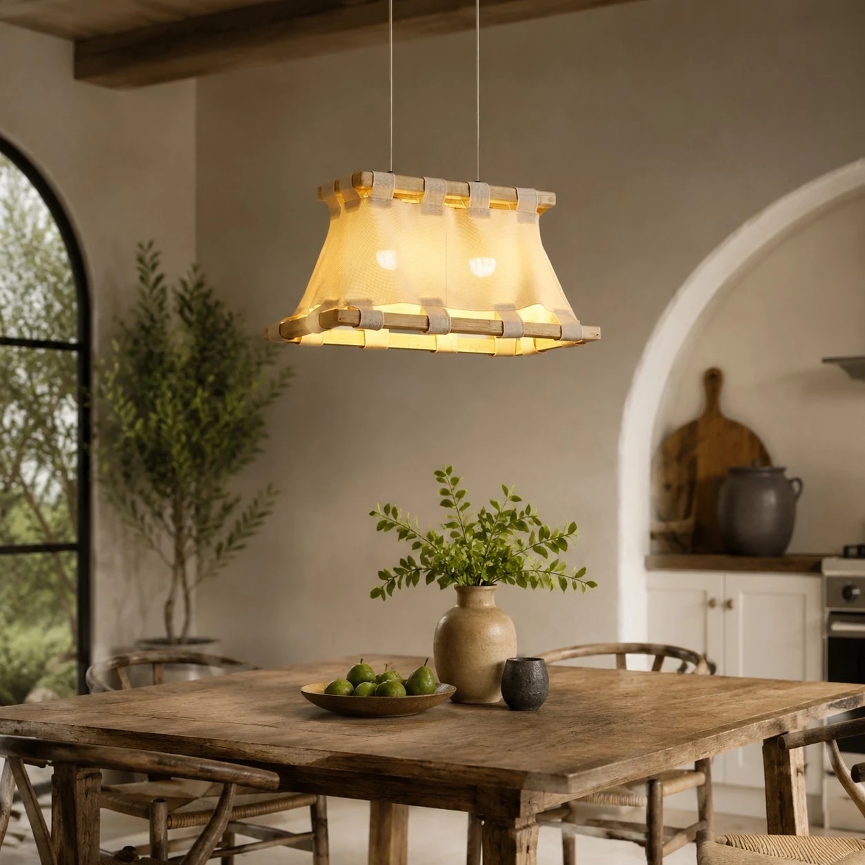 Wabi-sabi fabric pendant lamp above rustic dining table