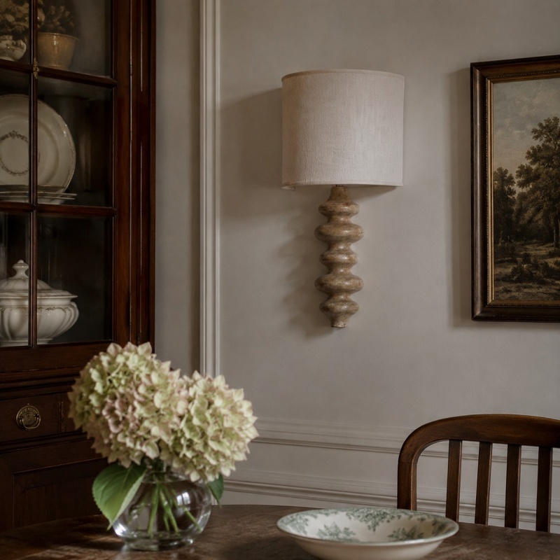 Natural wood wall lamp in a dining room setting